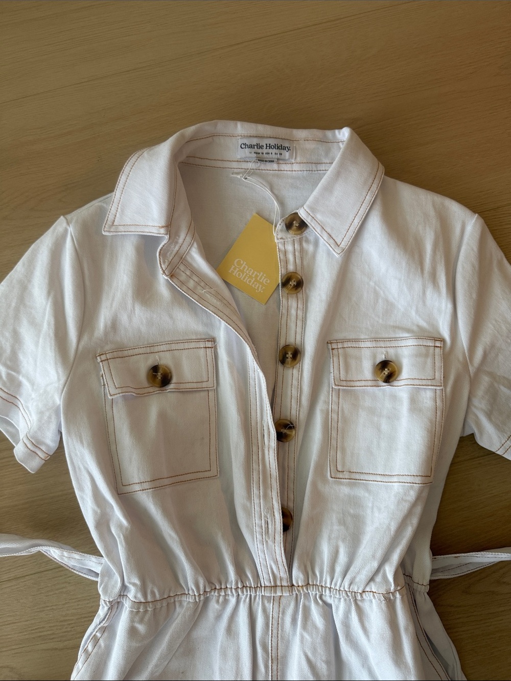 White Short-Sleeve Women’s Utility Romper with Button Front - Picture 2 of 5